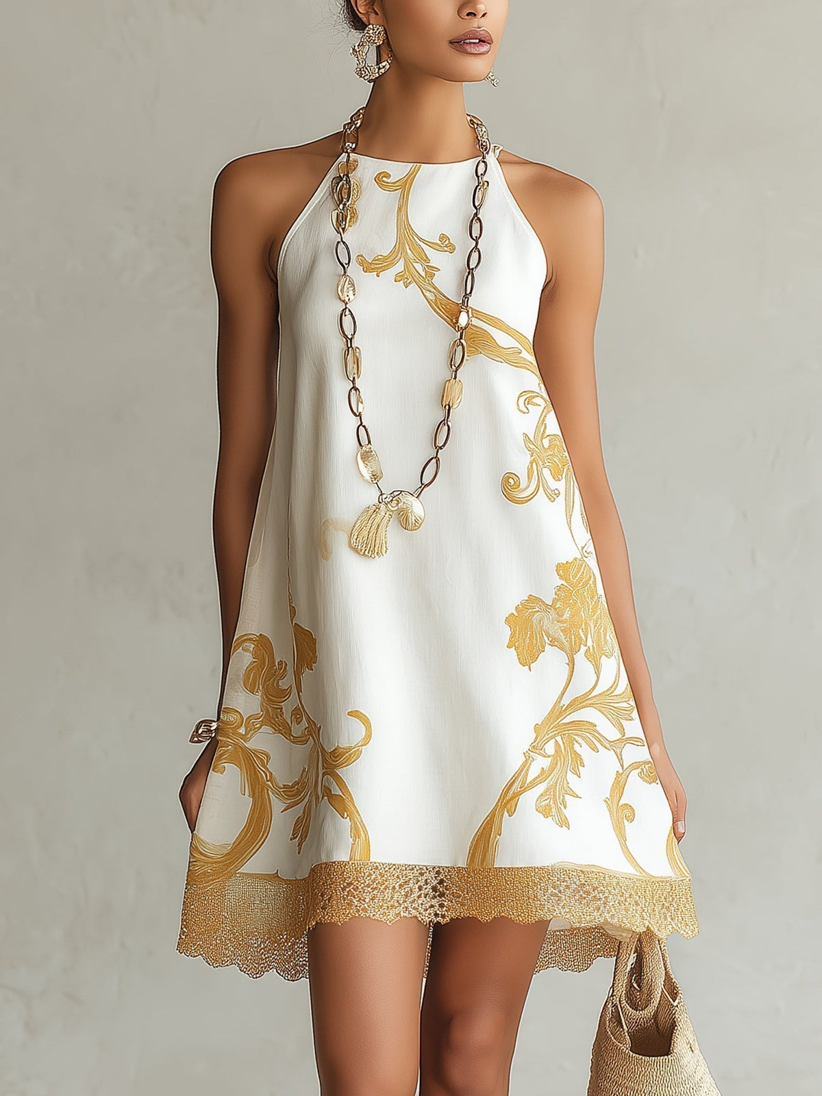Heloisa| Vestido mini de encaje blanco con motivos dorados