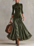 Vestido largo verde oliva con bajo de encaje