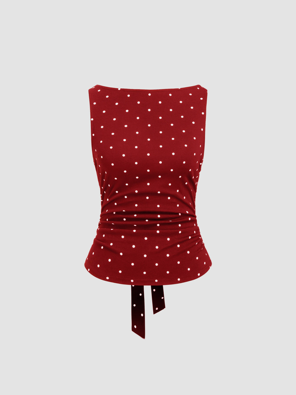 Triana Top de lunares que estiliza y eleva cualquier look
