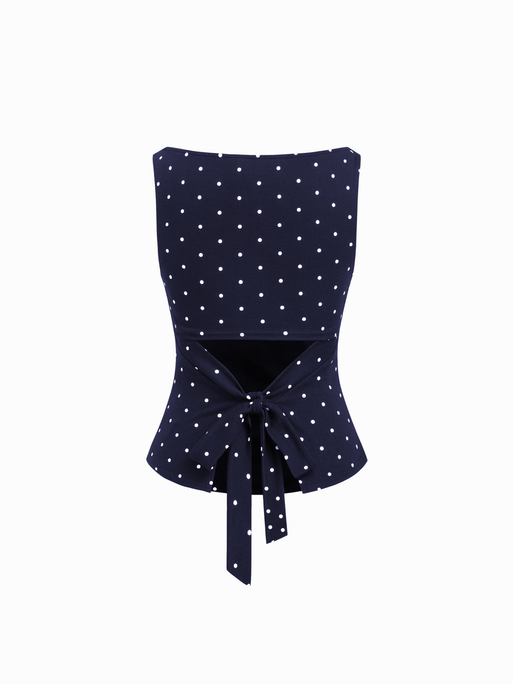 Triana Top de lunares que estiliza y eleva cualquier look