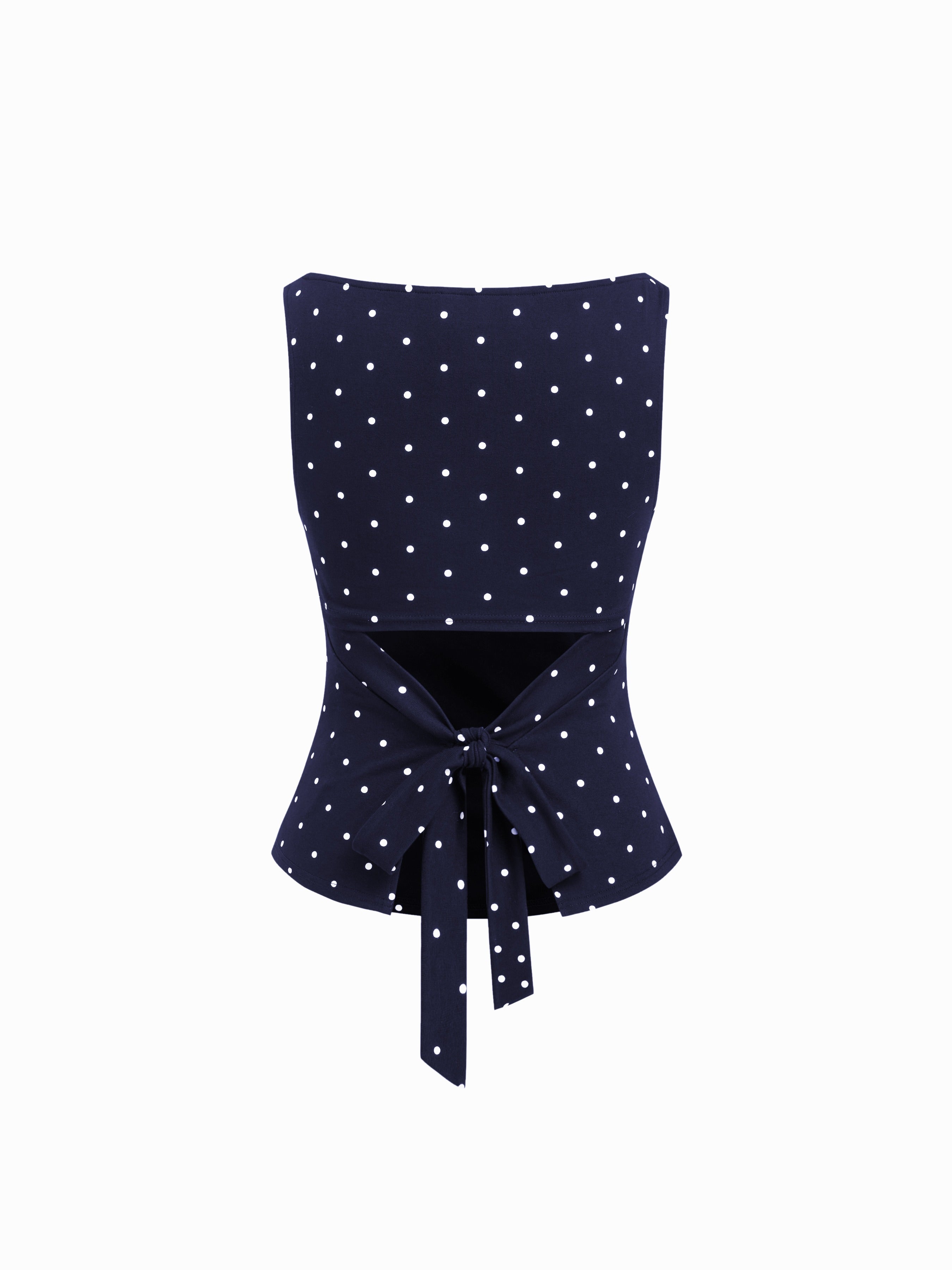 Triana Top de lunares que estiliza y eleva cualquier look