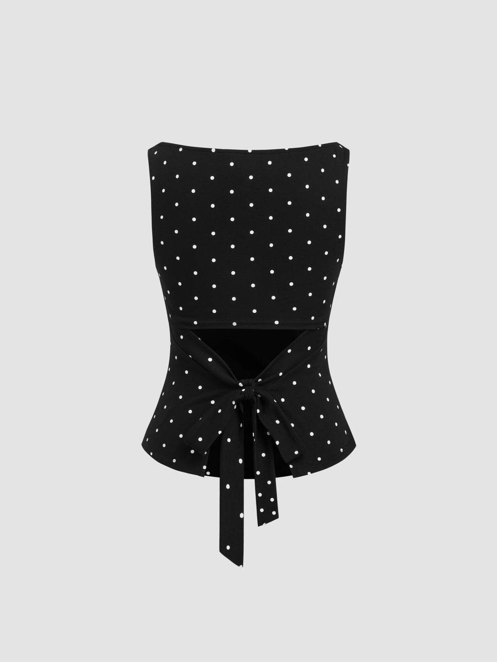 Triana Top de lunares que estiliza y eleva cualquier look
