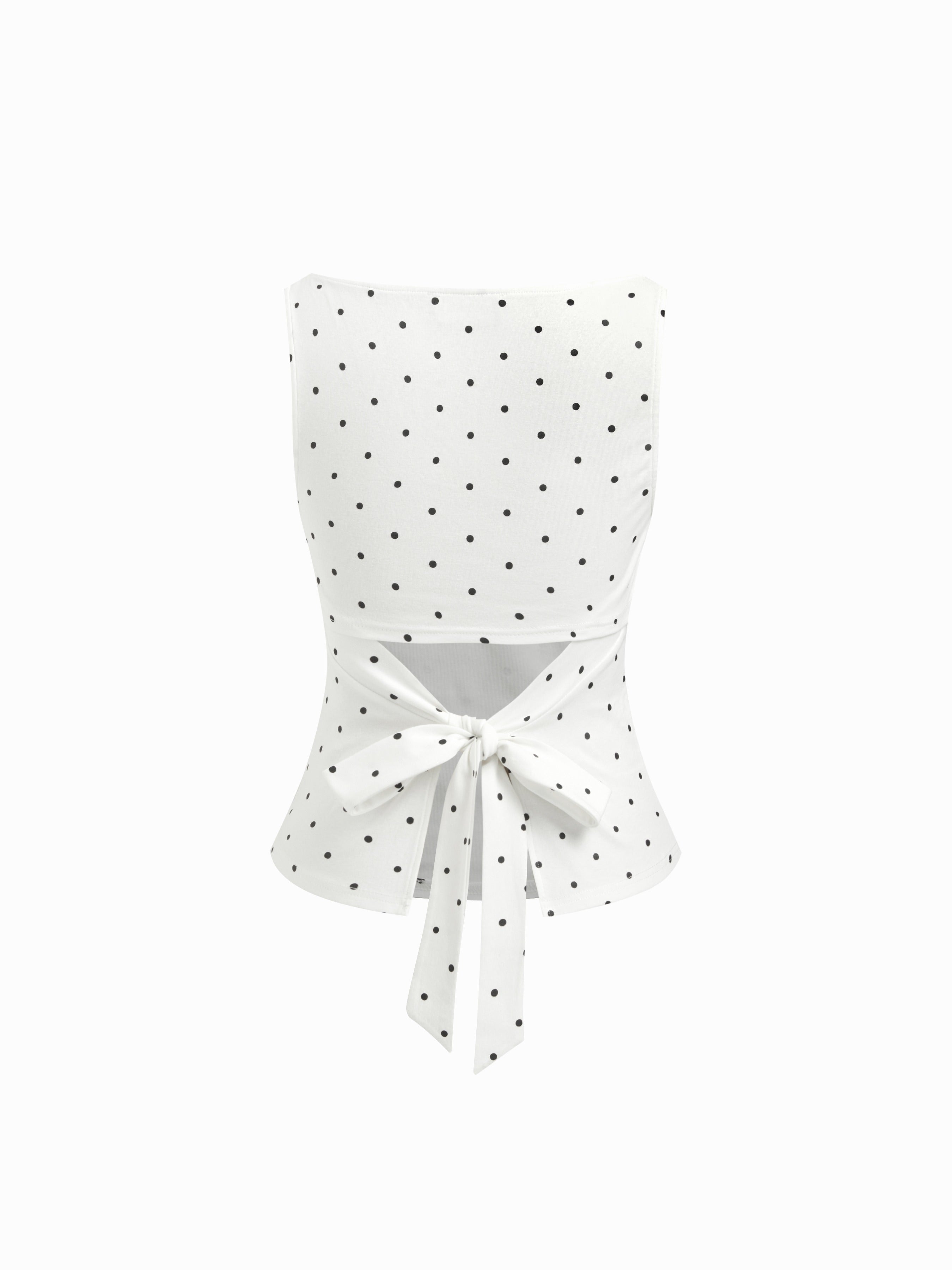 Triana Top de lunares que estiliza y eleva cualquier look